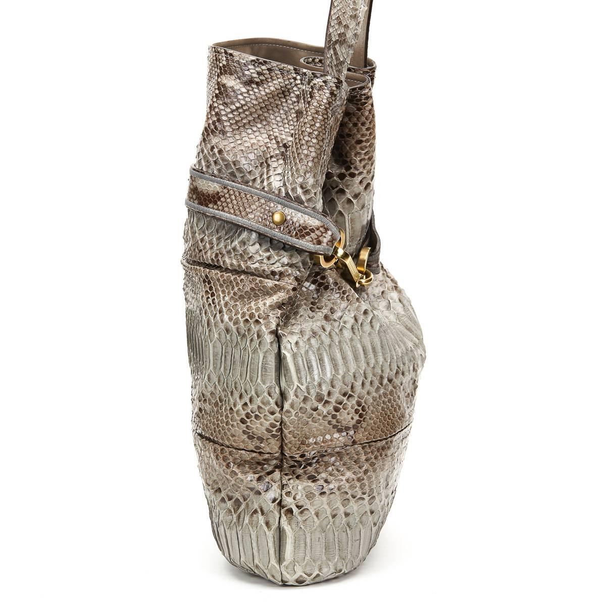 CHLOE
Taupe Python Joan Bucket Bag

This CHLOE Joan is in Very Good Pre-Owned Condition. Circa 2008. Primarily made from Python complimented by Gold hardware. Our  reference is HB668 should you need to quote this.

 Reference: HB668
Serial