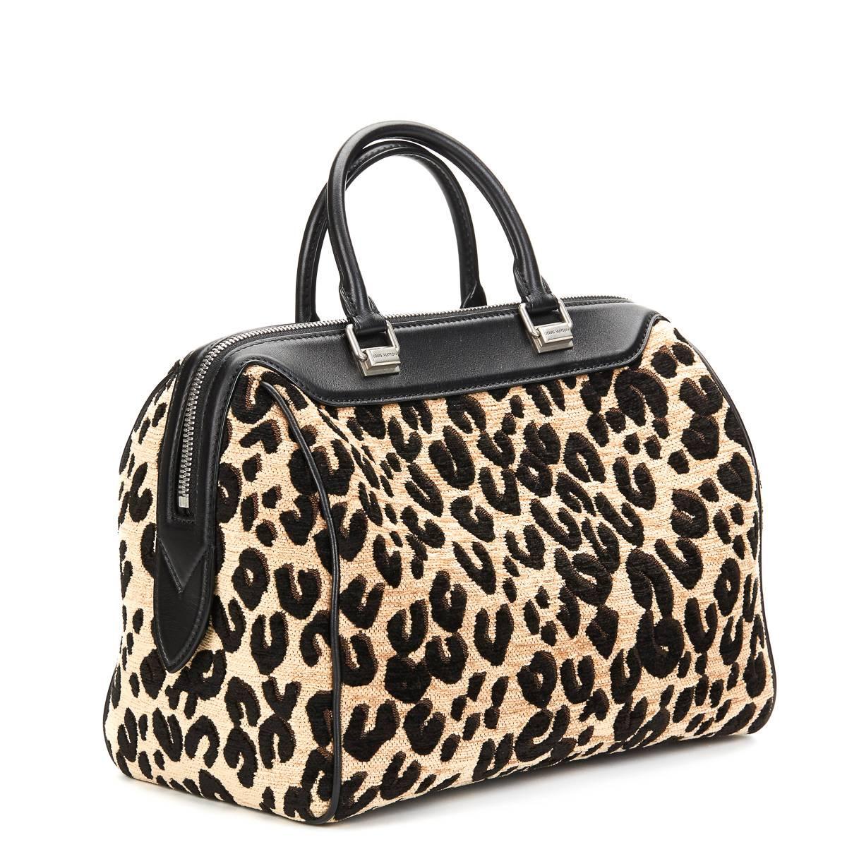 LOUIS VUITTON
Leopard Print Jacquard Velvet Stephen Sprouse Speedy 30

This LOUIS VUITTON Speedy 30 is in Excellent Pre-Owned Condition accompanied by Louis Vuitton Dust Bag, Care Card, Luggage Tag. Circa 2012. Primarily made from Velvet