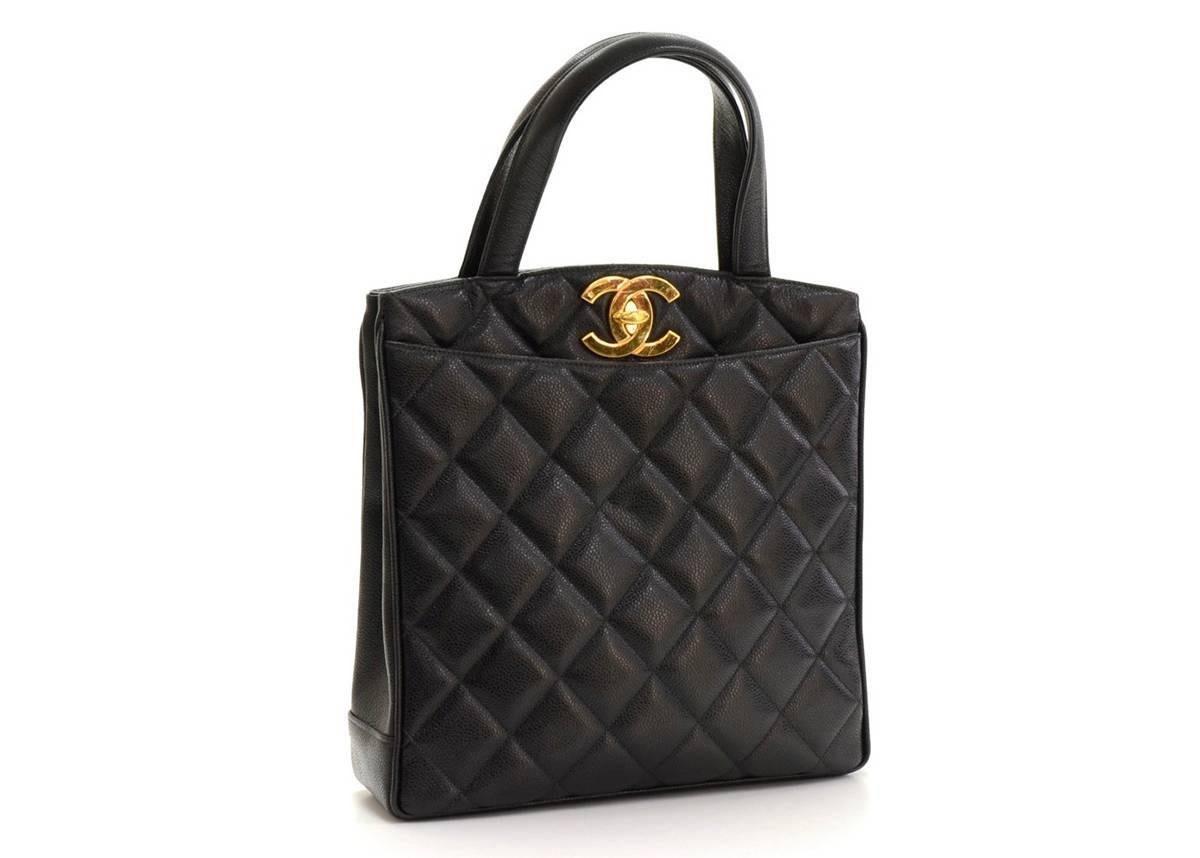 CHANEL
Black Quilted Caviar Leather Vintage Timeless Tote

This CHANEL Timeless Tote is in Very Good Pre-Owned Condition accompanied by Authenticity Card, Care Cards. Circa 1995. Primarily made from Caviar Leather complimented by Gold hardware. Our 