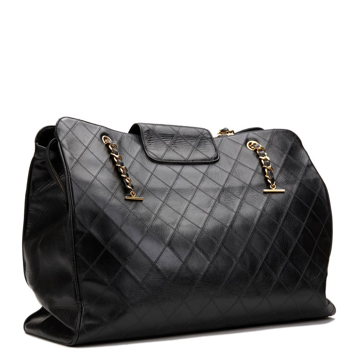 CHANEL
Black Quilted Lambskin Vintage Jumbo Supermodel Tote

This CHANEL Jumbo Supermodel Tote is in Excellent Pre-Owned Condition accompanied by Authenticity Card. Circa 1988. Primarily made from Lambskin Leather complimented by Gold hardware. Our 