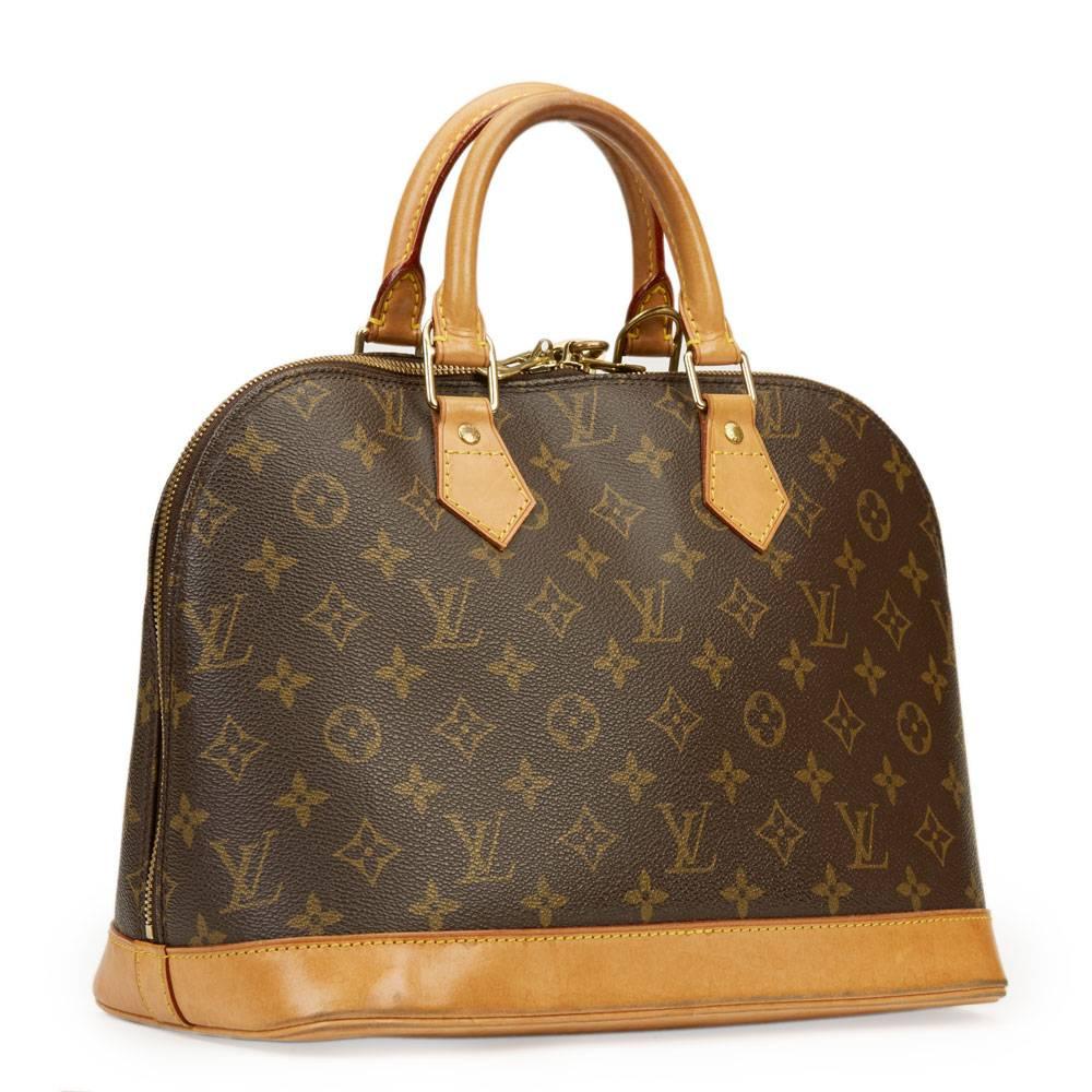 LOUIS VUITTON
 x Year Zero London Handpainted Ca$h Money 'For the Love of Money' Alma PM 3/3

This LOUIS VUITTON Alma PM is in Good Pre-Owned Condition accompanied by Padlock & Keys. Circa 2002. Primarily made from Coated Canvas complimented by