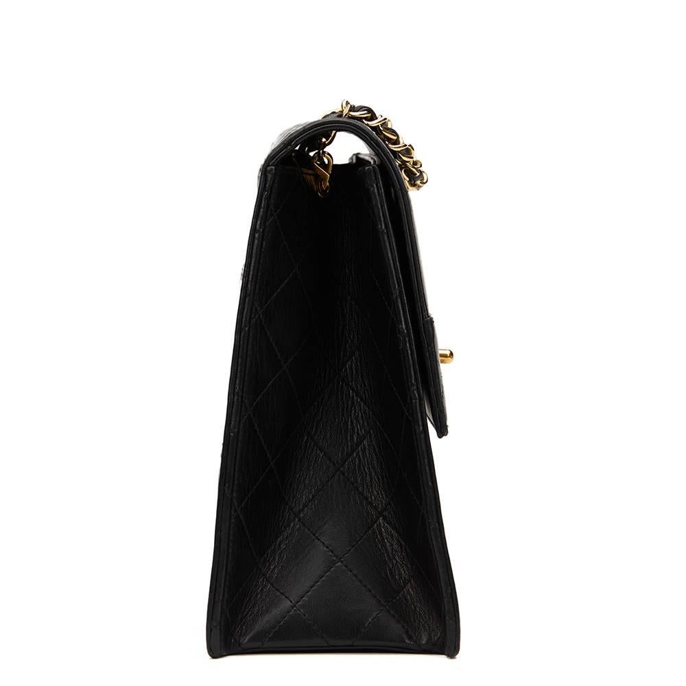 CHANEL
Black Quilted Lambskin Vintage Trapeze Single Flap Bag

This CHANEL Trapeze Single Flap Bag is in Very Good Pre-Owned Condition. Circa 1991. Primarily made from Lambskin Leather complimented by Gold hardware. Our  reference is HB836 should