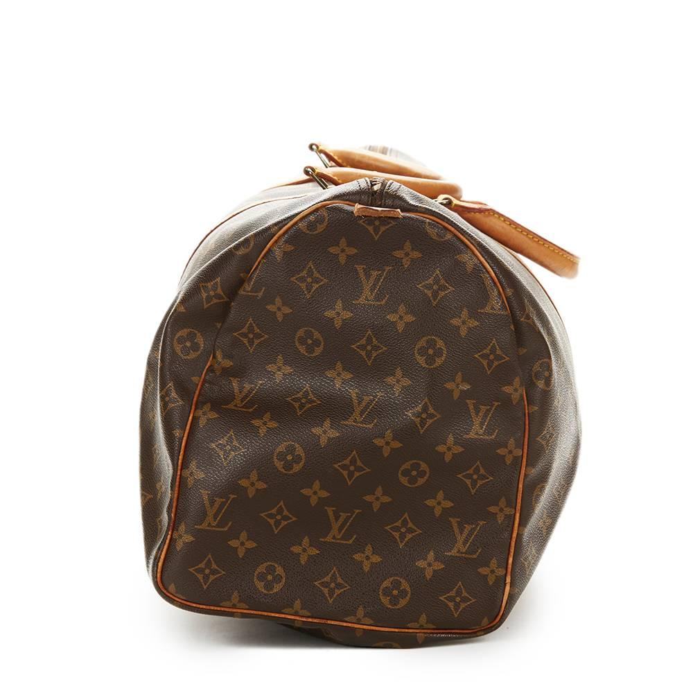 LOUIS VUITTON
Brown Coated Monogram Canvas Vintage Keepall 50

This LOUIS VUITTON Keepall 50 is in Good Pre-Owned Condition. Circa 1990. Primarily made from Coated Canvas complimented by Golden Brass hardware. Our  reference is HB1187 should you
