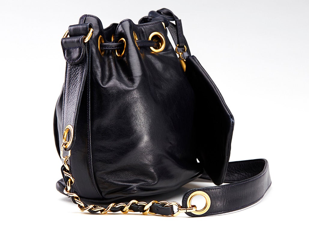 This Chanel Bucket Bag is in good pre-owned condition. This Chanel handbag has been fully inspected in house. Our authenticators and restoration team check all handbags, this ensures they are treated and restored when necessary with the utmost care