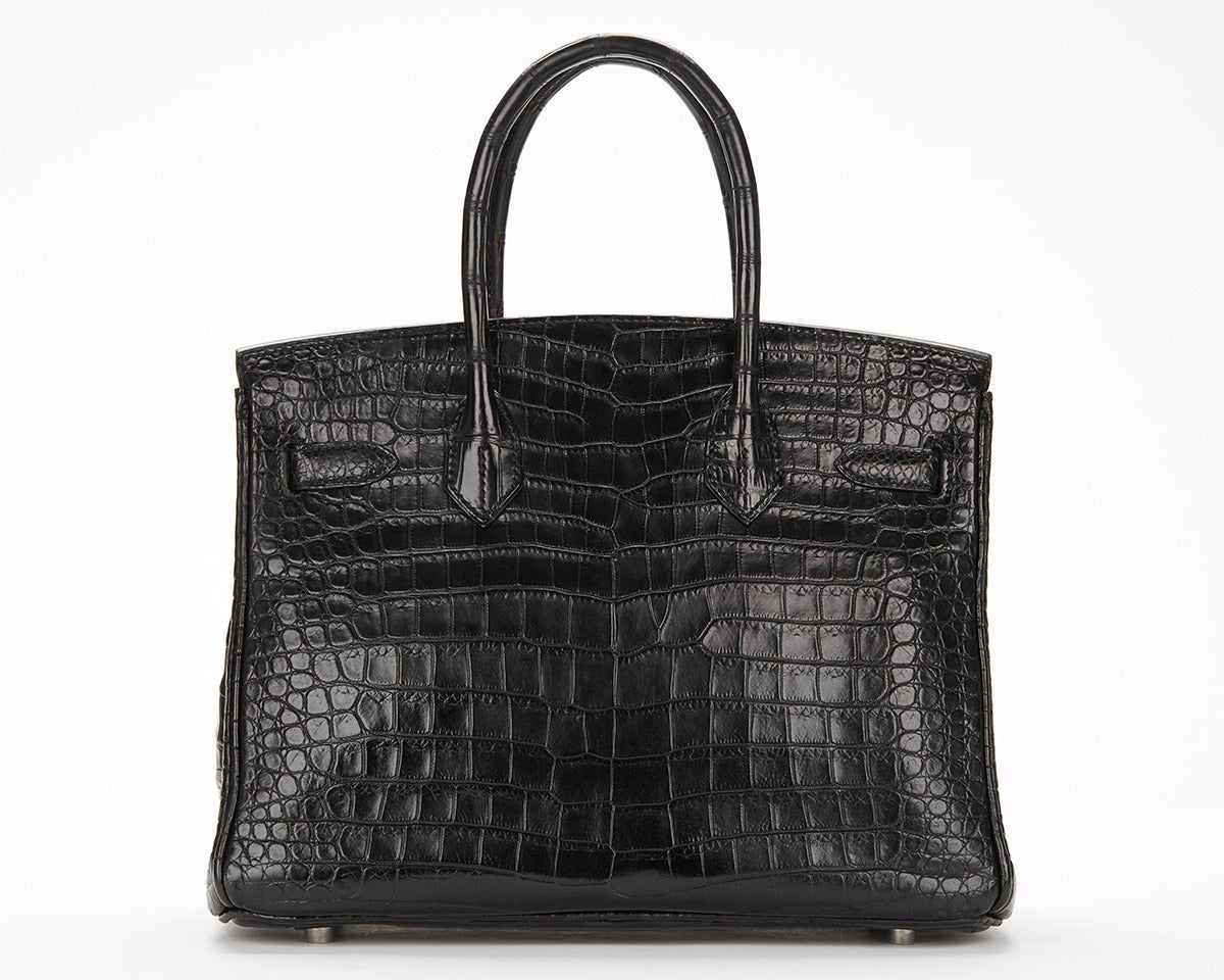 This Hermes Birkin 30cm Exotic is in excellent pre-owned condition and has been fully inspected in house. Our authenticators and restoration team check all handbags, this ensures they are treated and restored when necessary with the utmost care and