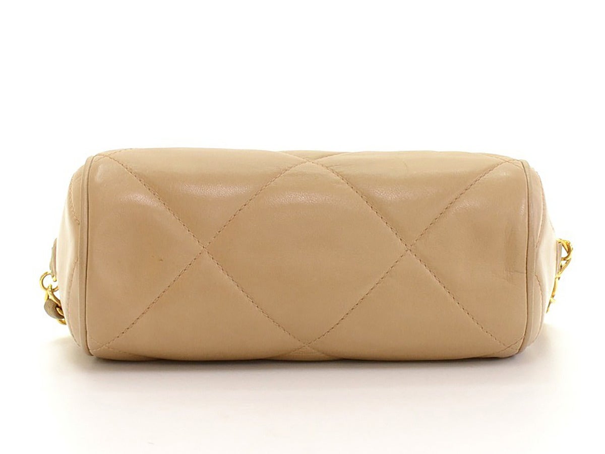 1990s Chanel Tan Quilted Leather Mini CC Logo Shoulder Fringe Tassel Bag 1
