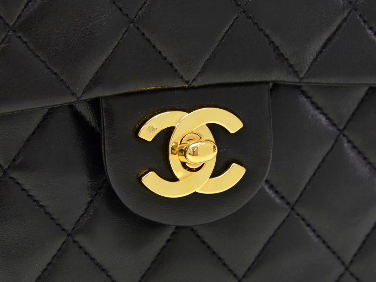 1990s Chanel Black Quilted Leather Mini Flap Bag 2