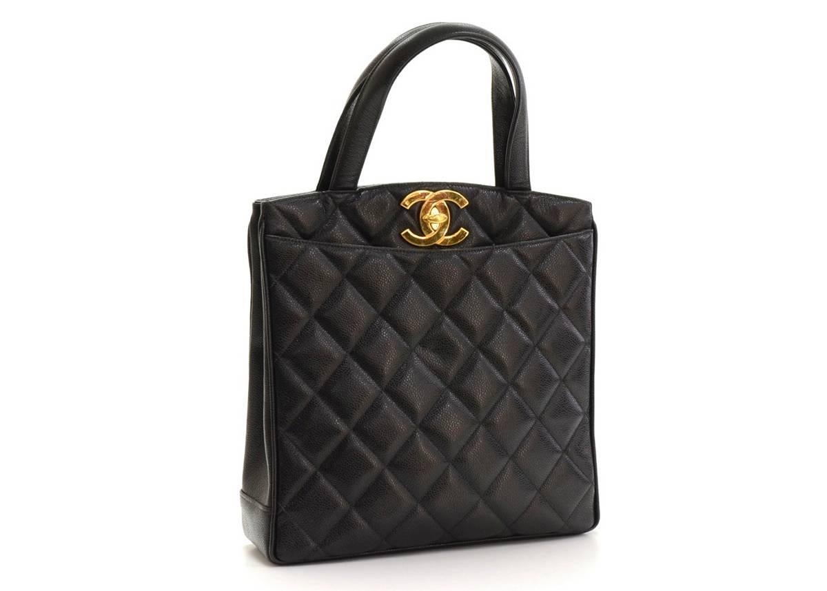 This ladies Chanel CC Tote is in excellent pre-owned condition accompanied by authenticity card. Circa 1995. Primarily made from Caviar Leather complimented by Gold hardware. Our  reference is HB088 should you need to quote this.

This Chanel