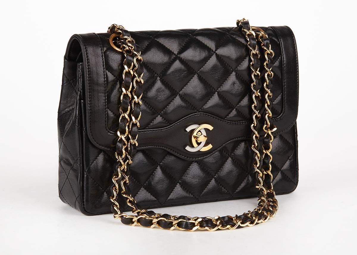 This ladies Chanel Single Flap Bag is primarily made from black lambskin leather complimented by gold & silver hardware. This bag is in very good pre-owned condition accompanied by Chanel box, authenticity card. Circa 1994. Our  reference is HB115