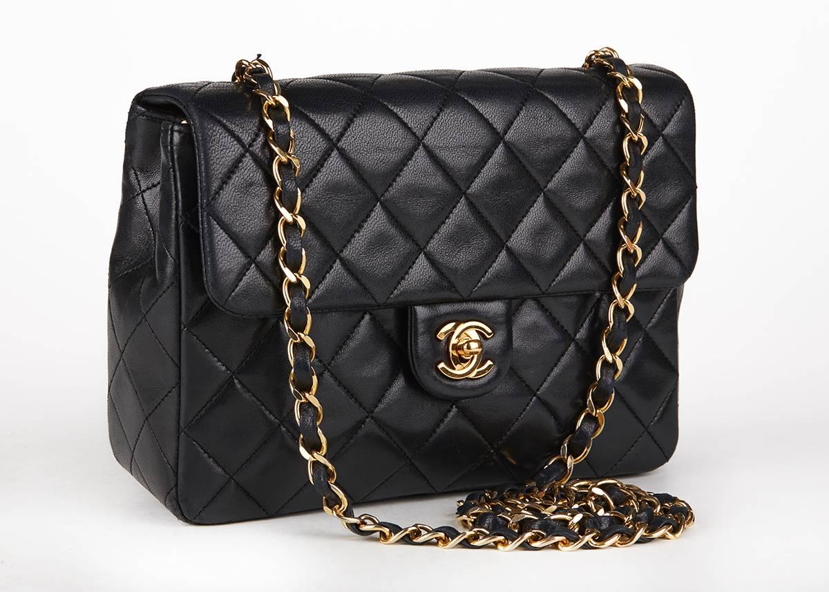 This unisex Chanel Single Flap Bag is primarily made from black lambskin complimented by gold hardware. This bag is in very good pre-owned condition accompanied by Chanel dust bag, box, authenticity card. Circa 1991. Our  reference is HB118 should