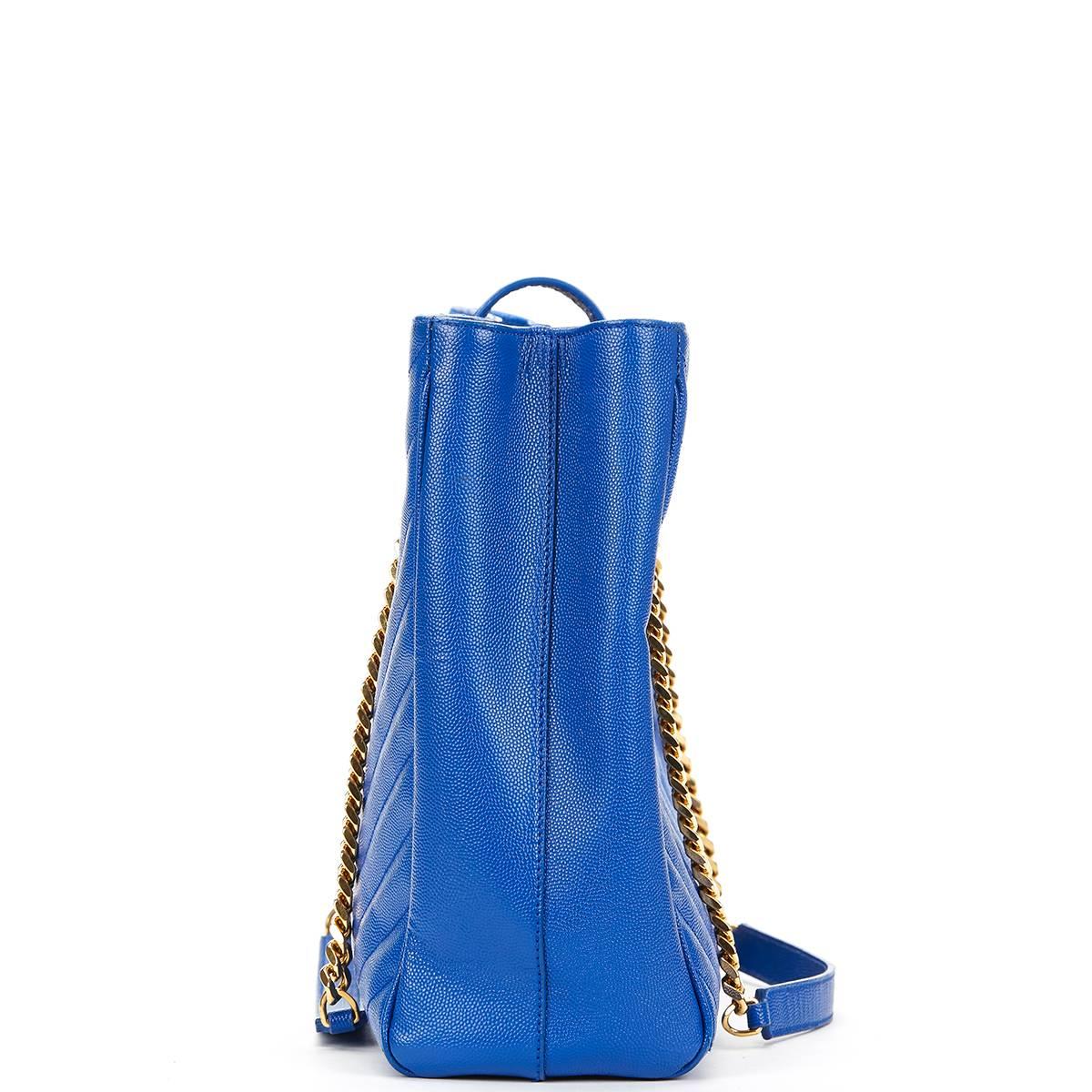 SAINT LAURENT
Electric Blue Textured Calfskin Large Monogram Tote

This SAINT LAURENT Large Monogram Tote is in Excellent Pre-Owned Condition accompanied by Saint Laurent Dust Bag. Circa 2014. Primarily made from Grained Calfskin complimented by