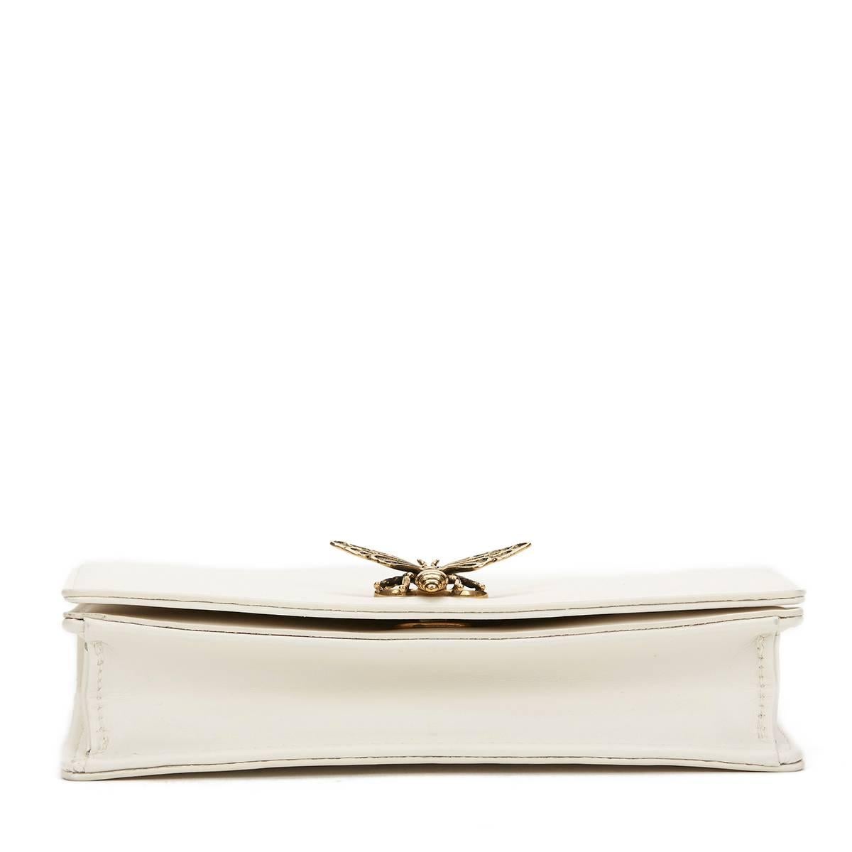 CHRISTIAN DIOR
White Calfskin Bee Pouch

This CHRISTIAN DIOR Bee Pouch is in Unworn Condition accompanied by Dior Dust Bag, Box, Care Card. Circa 2016. Primarily made from Calfskin Leather complimented by Antiqued Gold hardware. Our  reference is