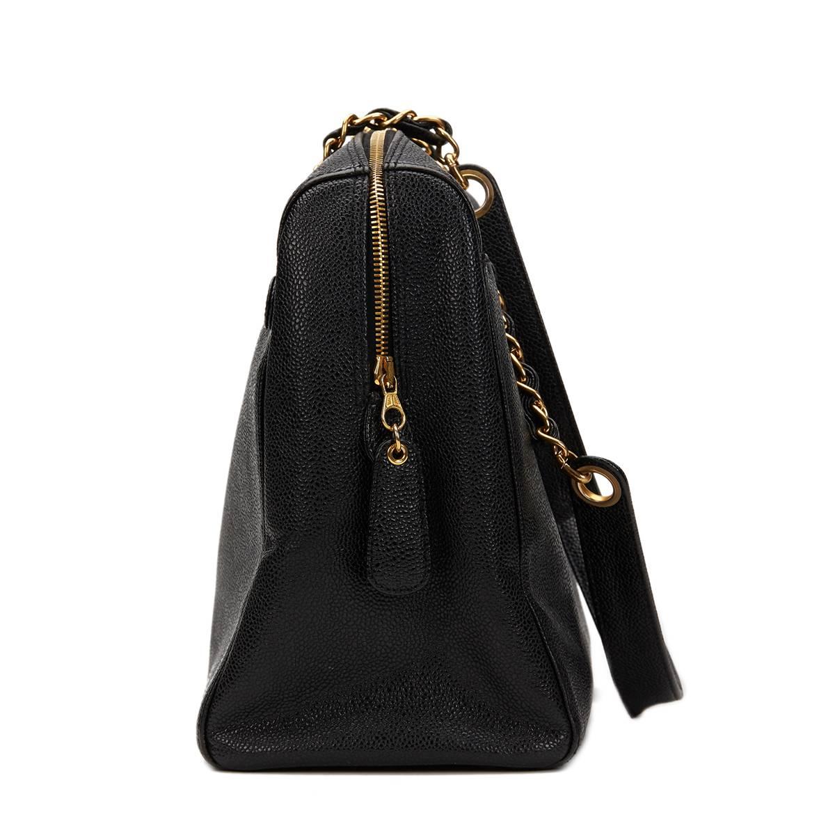 CHANEL
Black Caviar Leather Vintage Timeless Shoulder Bag

This CHANEL Timeless Shoulder Bag is in Excellent Pre-Owned Condition accompanied by Chanel Dust Bag. Circa 1996. Primarily made from Caviar Leather complimented by Gold hardware. Our 