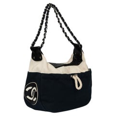 Chanel Navy, Beige Canvas & Black Quilted Lambskin Cruise Timeless Hobo Bag