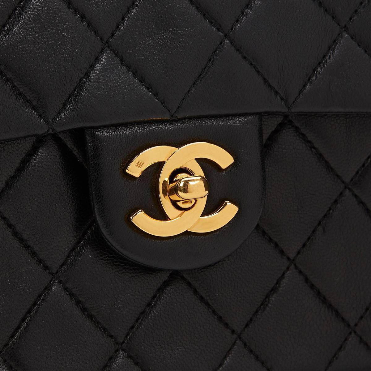 1980s Chanel Black Quilted Lambskin Vintage Mini Flap Bag 5