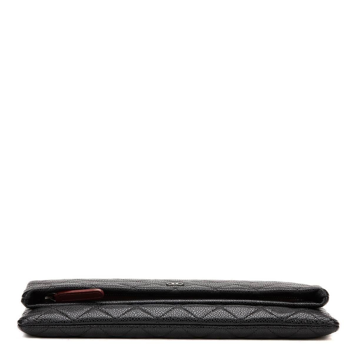 CHANEL
Black Quilted Caviar Leather Beauty CC Foldover Clutch

This CHANEL Beauty CC Foldover Clutch is in Excellent Pre-Owned Condition accompanied by Chanel Dust Bag, Authenticity Card. Circa 2015. Primarily made from Caviar Leather complimented