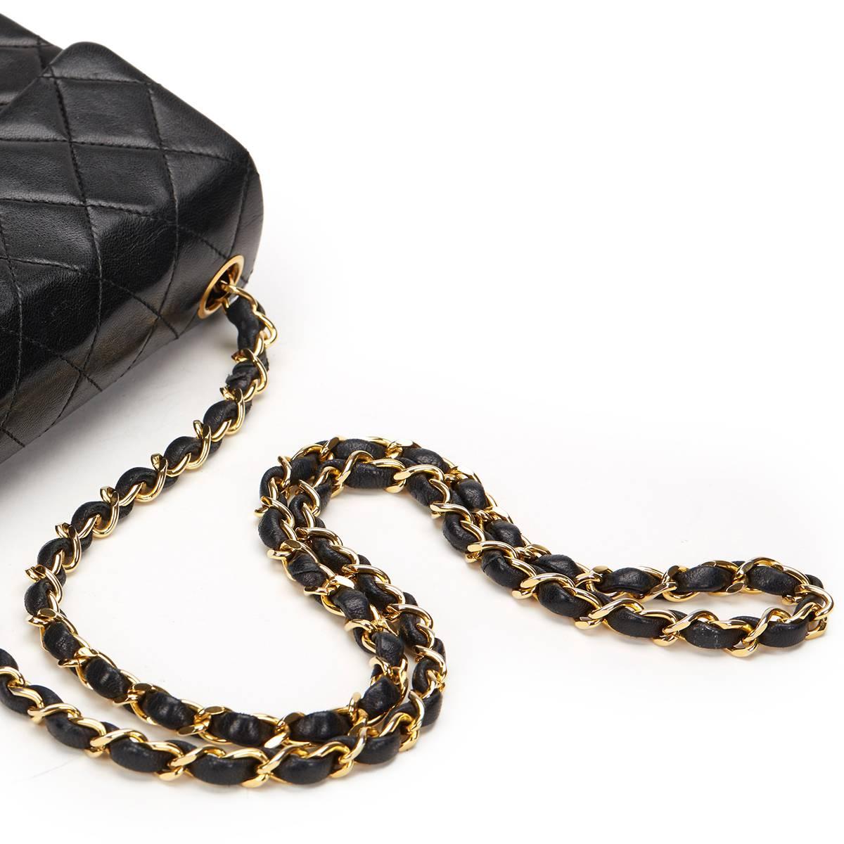 1980s Chanel Black Quilted Lambskin Vintage Mini Flap Bag 2