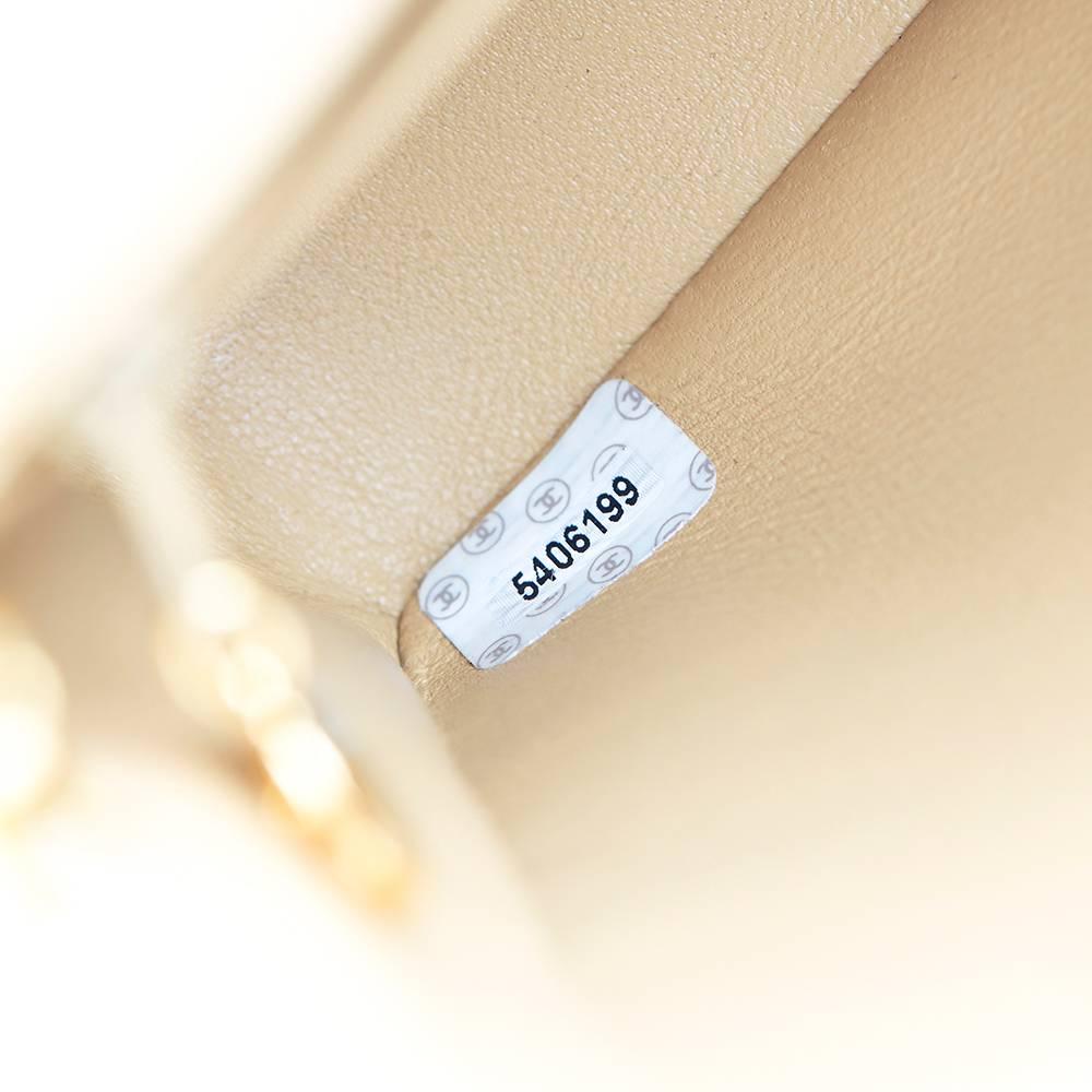 Women's 1990s Chanel Beige Quilted Lambskin Vintage Mini Flap Bag