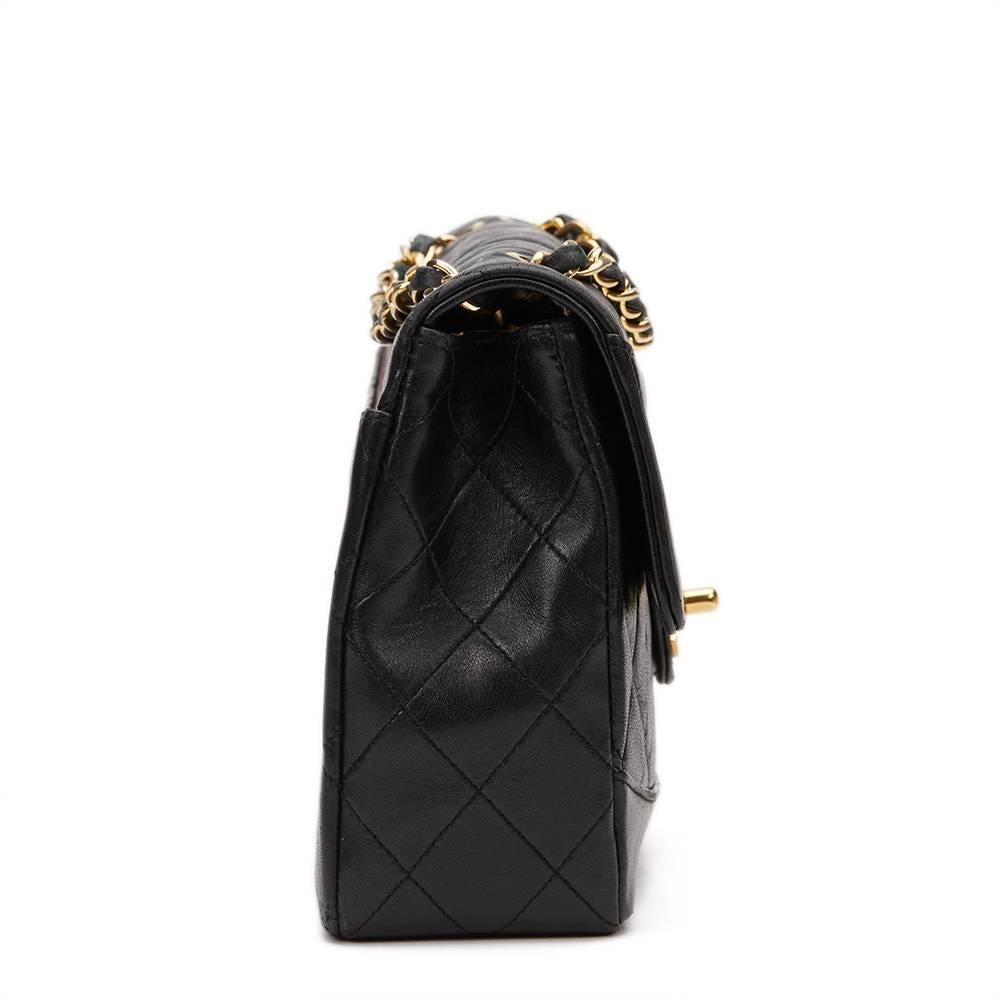 CHANEL
Black Quilted Lambskin Vintage Classic Single Flap Bag

This CHANEL Classic Single Flap Bag is in Very Good Pre-Owned Condition accompanied by Interior Purse. Circa 1991. Primarily made from Lambskin Leather complimented by Gold hardware. Our