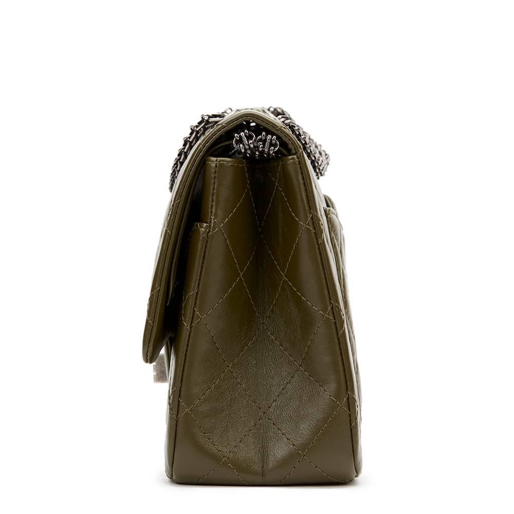 CHANEL
Olive Aged Calfskin 2.55 Reissue 227 Double Flap Bag

This CHANEL 2.55 Reissue 227 Double Flap Bag is in Excellent Pre-Owned Condition. Circa 2014. Primarily made from Aged Calfskin complimented by Ruthenium hardware. Our  reference is HB1010