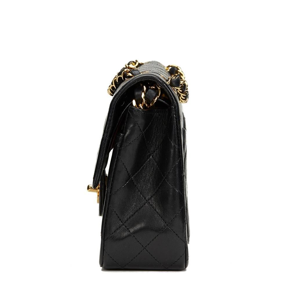 CHANEL
Black Quilted Lambskin Vintage Small Classic Double Flap Bag

This CHANEL Small Classic Double Flap Bag is in Excellent Pre-Owned Condition accompanied by Chanel Dust Bag, Box, Authenticity Card. Circa 1986. Primarily made from Lambskin