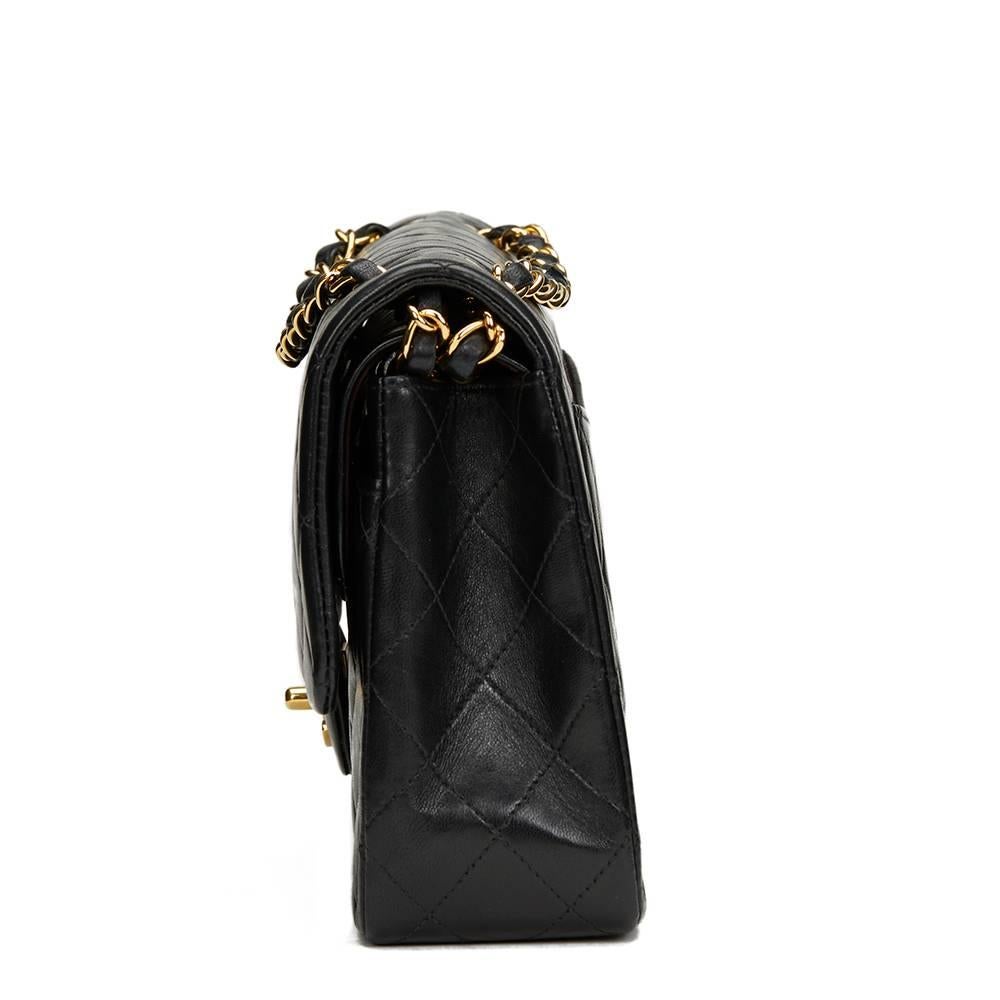 CHANEL
Black Quilted Lambskin Medium Classic Double Flap Bag

This CHANEL Medium Classic Double Flap Bag is in Excellent Pre-Owned Condition accompanied by Chanel Dust Bag, Box. Circa 2002. Primarily made from Lambskin Leather complimented by Gold