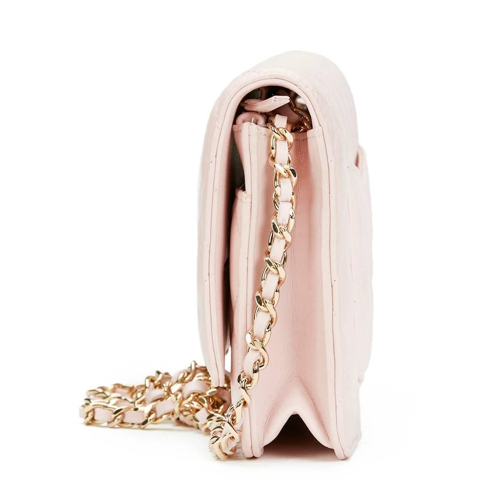CHANEL
Pink Quilted Lambskin Leather Wallet-on-Chain WOC

This CHANEL Wallet-on-Chain is in Excellent Pre-Owned Condition accompanied by Chanel Dust Bag, Box, Authenticity Card. Circa 2013. Primarily made from Lambskin Leather complimented by