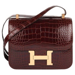 Hermès Constance 24 aus glänzendem Bordeaux-farbigem Mississippiensis-Alligatorleder