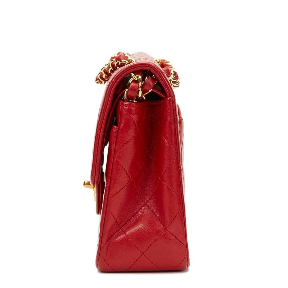 CHANEL
Red Quilted Lambskin Vintage Small Classic Double Flap

This CHANEL Small Classic Double Flap Bag is in Very Good Pre-Owned Condition. Circa 1987. Primarily made from Lambskin Leather complimented by Gold hardware. Our  reference is HB1132