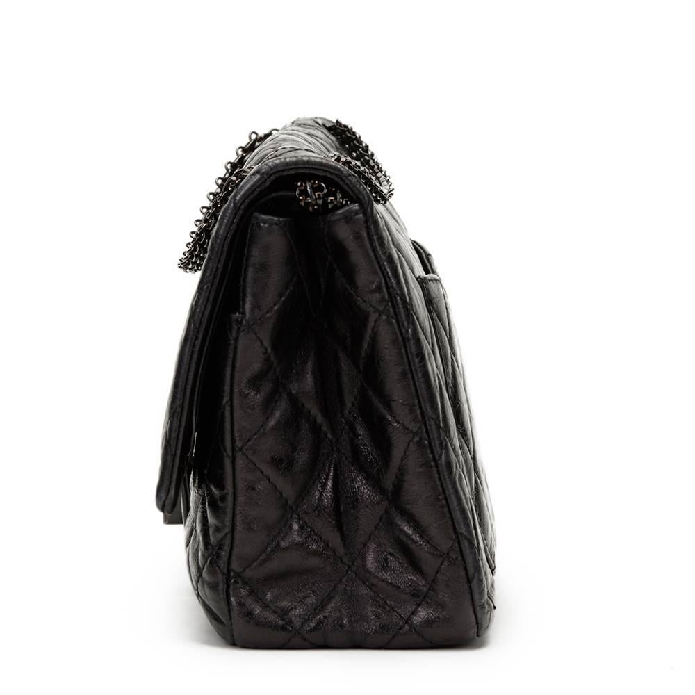 CHANEL
Black Glazed Calfskin SO Black 2.55 Reissue 227 Double Flap Bag

This CHANEL 2.55 Reissue 227 Double Flap Bag is in Very Good Pre-Owned Condition. Circa 2009. Primarily made from Glazed Calfskin complimented by Black hardware. Our  reference