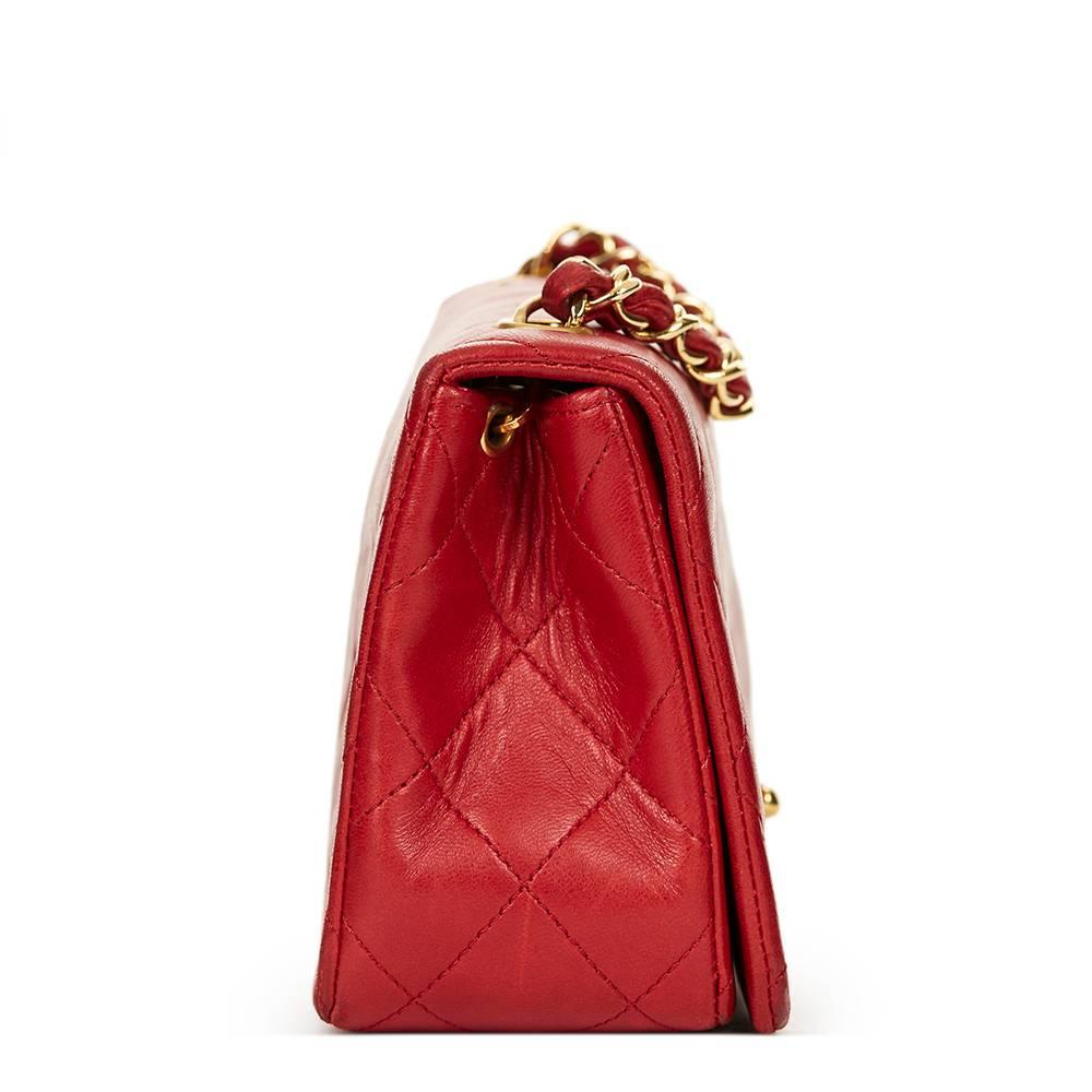 CHANEL
Red Quilted Lambskin Vintage Mini Flap Bag

This CHANEL Mini Flap Bag is in Very Good Pre-Owned Condition accompanied by Chanel Dust Bag, Authenticity Card. Circa 1990. Primarily made from Lambskin Leather complimented by Gold (24k Plated)