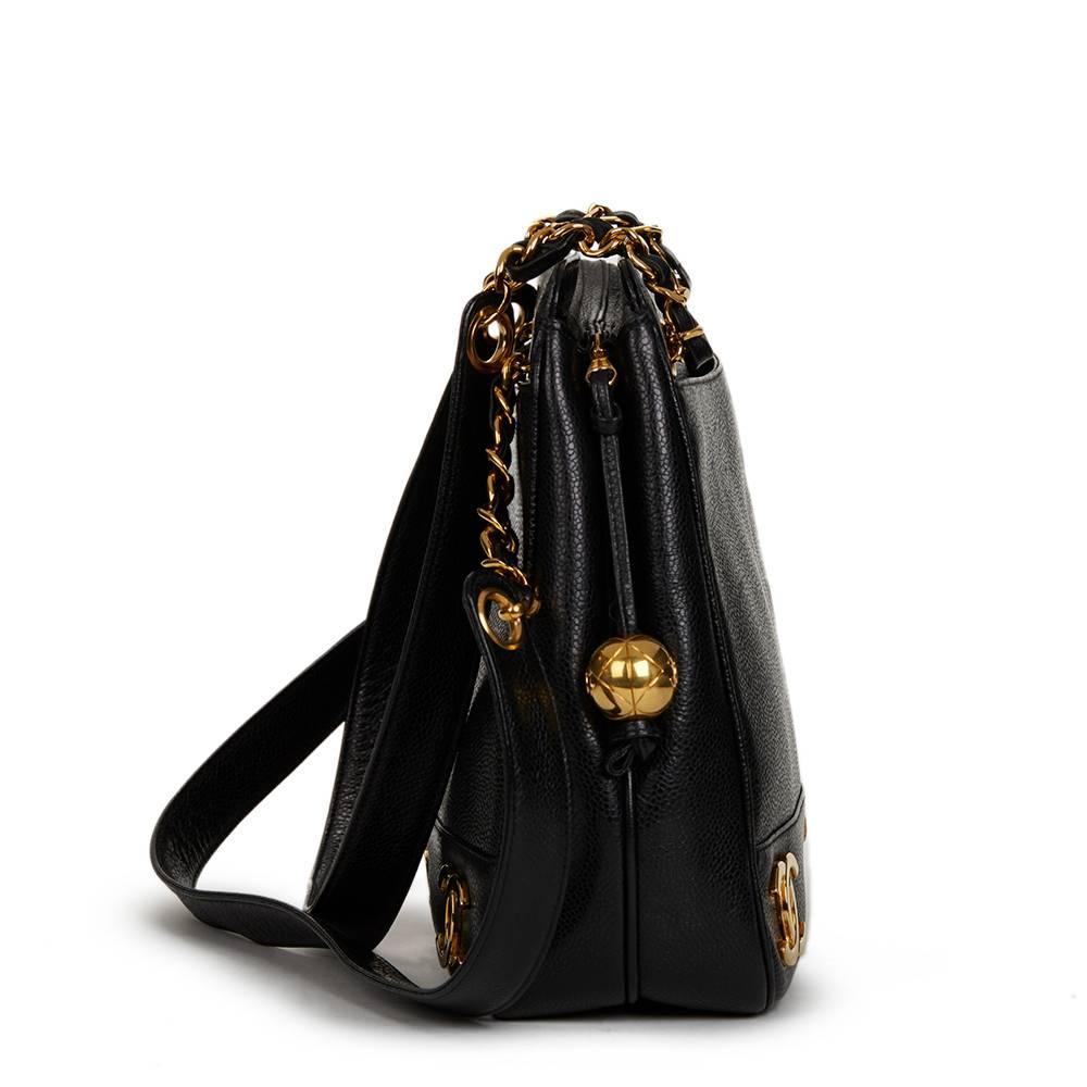 CHANEL
Black Caviar Leather Vintage Timeless Shoulder Bag

This CHANEL Timeless Shoulder Bag is in Excellent Pre-Owned Condition. Circa 1994. Primarily made from Caviar Leather complimented by Gold hardware. Our  reference is HB1307 should you need