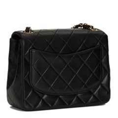 2004 Chanel Schwarzes gestepptes Lammfell Mini-Klappentasche