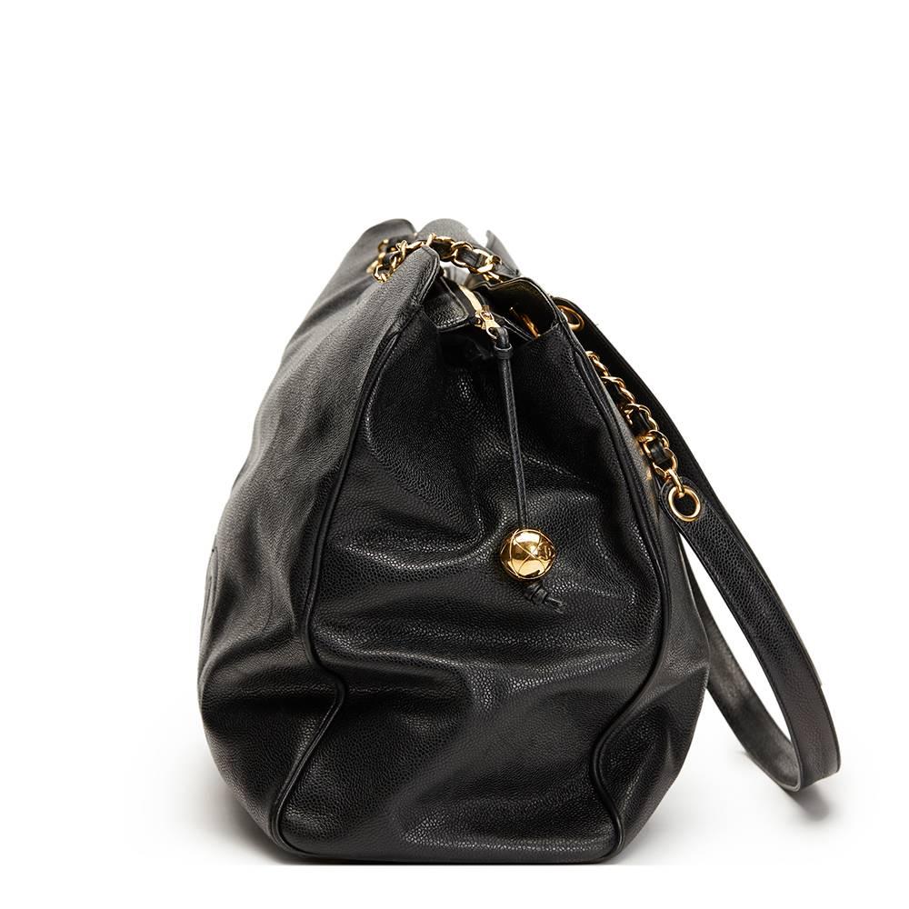 CHANEL
Black Caviar Leather Vintage Jumbo Supermodel Tote

This CHANEL Jumbo Supermodel Tote is in Very Good Pre-Owned Condition. Circa 1994. Primarily made from Caviar Leather complimented by Gold (24k Plated) hardware. Our  reference is HB1359