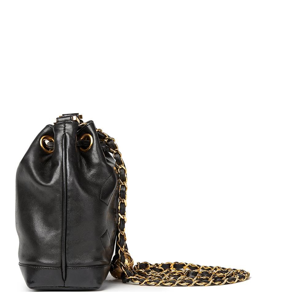 CHANEL
Black Lambskin Vintage Mini Bucket Bag

This CHANEL Mini Bucket Bag is in Very Good Pre-Owned Condition accompanied by Chanel Dust Bag, Interior Pouch. Circa 1996. Primarily made from Lambskin Leather complimented by Gold hardware. Our 