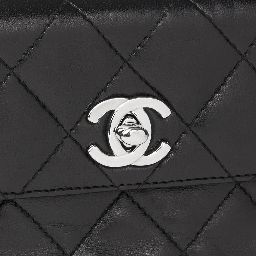 1990s Chanel Black Quilted Lambskin Vintage Mini Flap Bag 2