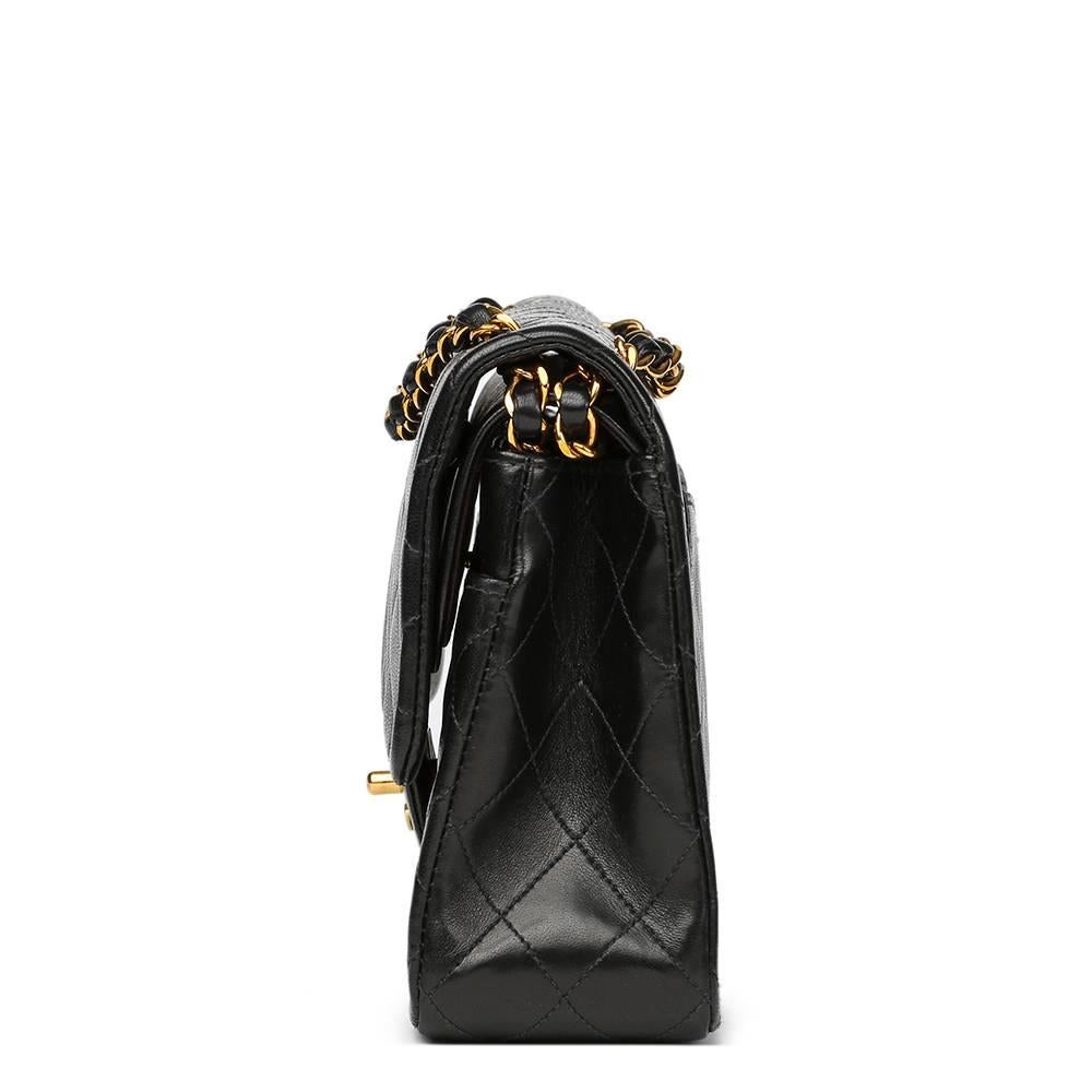 CHANEL
Black Quilted Lambskin Vintage Medium Classic Double Flap Bag

This CHANEL Medium Classic Double Flap Bag is in Excellent Pre-Owned Condition accompanied by Chanel Dust Bag, Box, Authenticity Card. Circa 1997. Primarily made from Lambskin