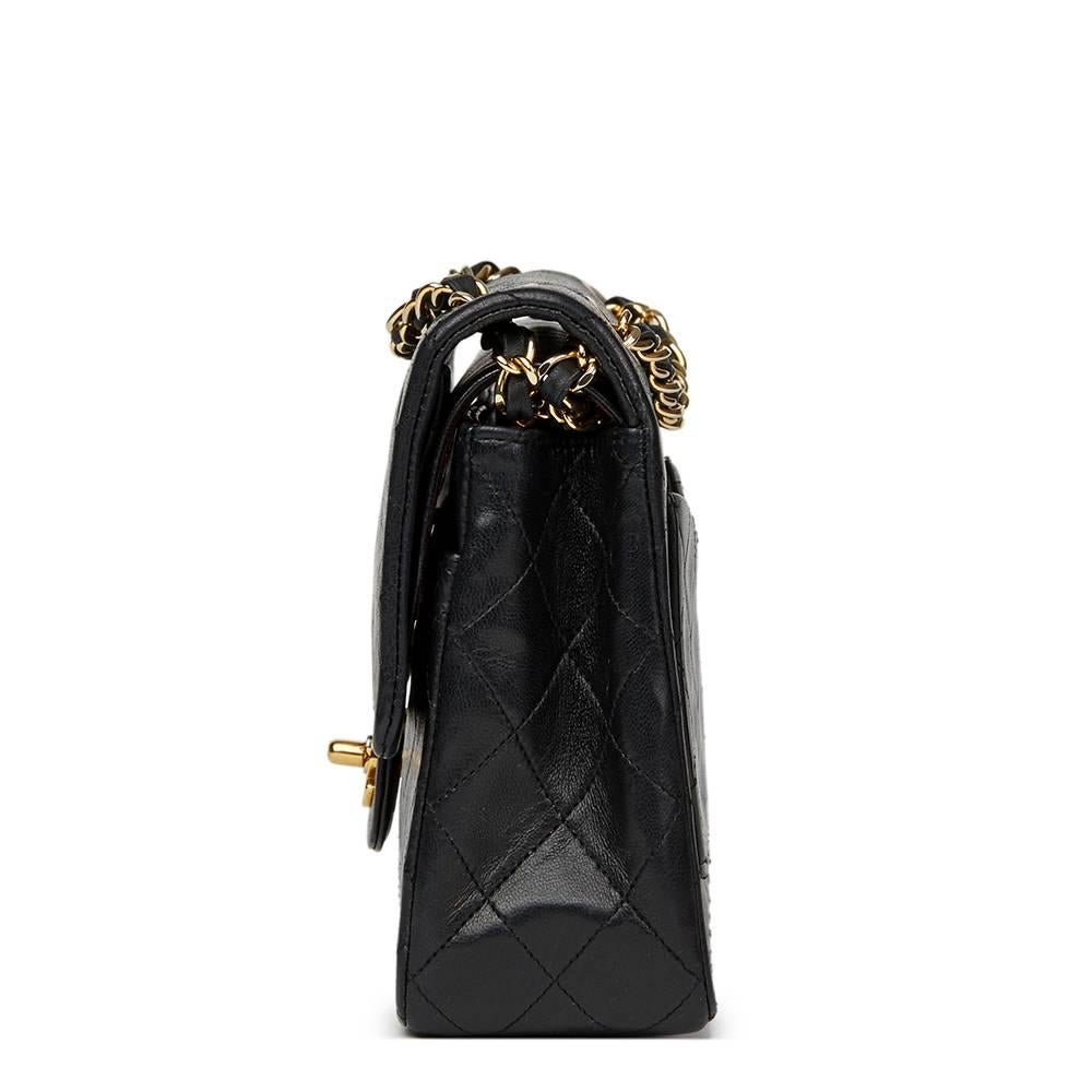 CHANEL
Black Quilted Lambskin Vintage Medium Classic Double Flap Bag

This CHANEL Medium Classic Double Flap Bag is in Very Good Pre-Owned Condition accompanied by Chanel Dust Bag. Circa 1990. Primarily made from Lambskin Leather complimented by