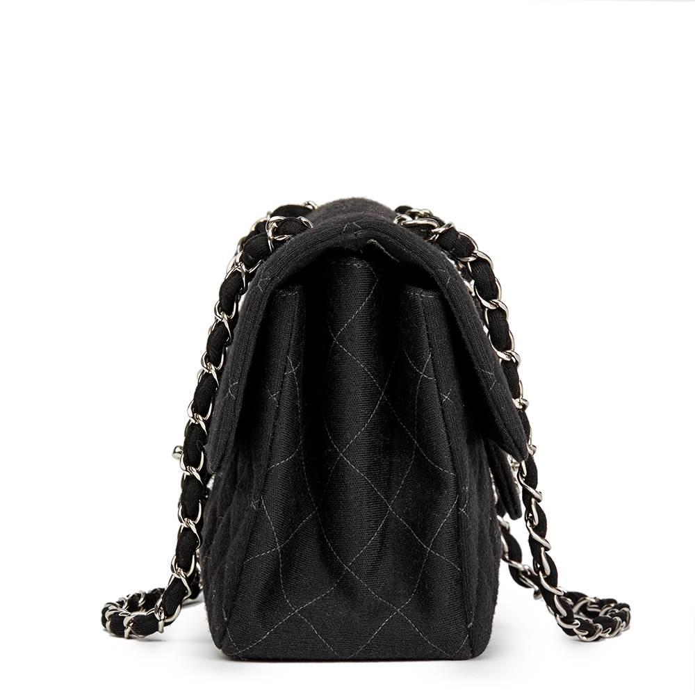 CHANEL
Black Quilted Jersey Fabric Vintage Double Sided Medium Classic Flap Bag

This CHANEL Double Sided Medium Classic Flap Bag is in Excellent Pre-Owned Condition accompanied by Authenticity Card. Circa 1996. Primarily made from Jersey Fabric