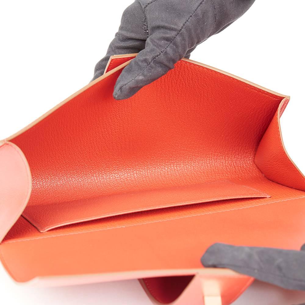 Women's Hermes Sanguine Tadelakt Leather Medor 23 Clutch