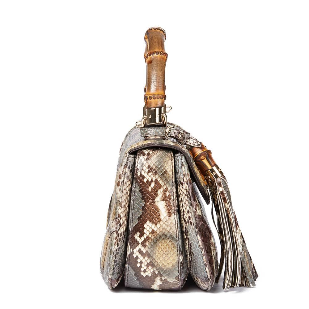 GUCCI
Khaki Python Leather Bamboo Classic Top Handle

 Reference: HB1561
Serial Number: 254884 218817
Age (Circa): 2010
Accompanied By: Gucci Dust Bag, Mirror, Shoulder Strap, Care Booklet, Leather Swatch, Detachable Tassel Charm
Authenticity