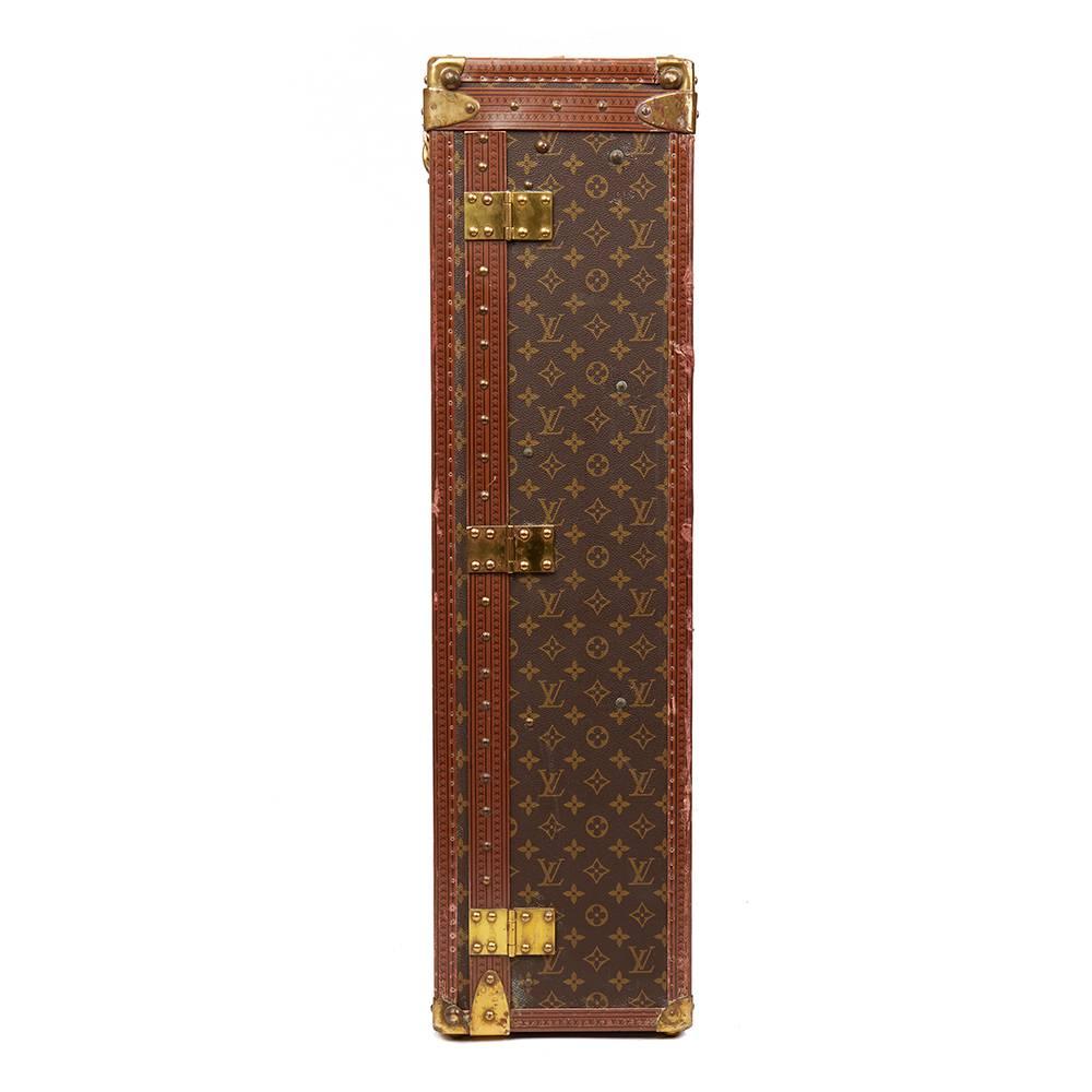 LOUIS VUITTON
Brown Monogram Coated Canvas Vintage Custom Wardrobe Trunk

Reference: HB1623
Serial Number: 961059
Age (Circa): 1980
Accompanied By: 6 Louis Vuitton Hangers, 3 Trouser Hangers
Authenticity Details: Date Stamp (Made in France)
Gender: