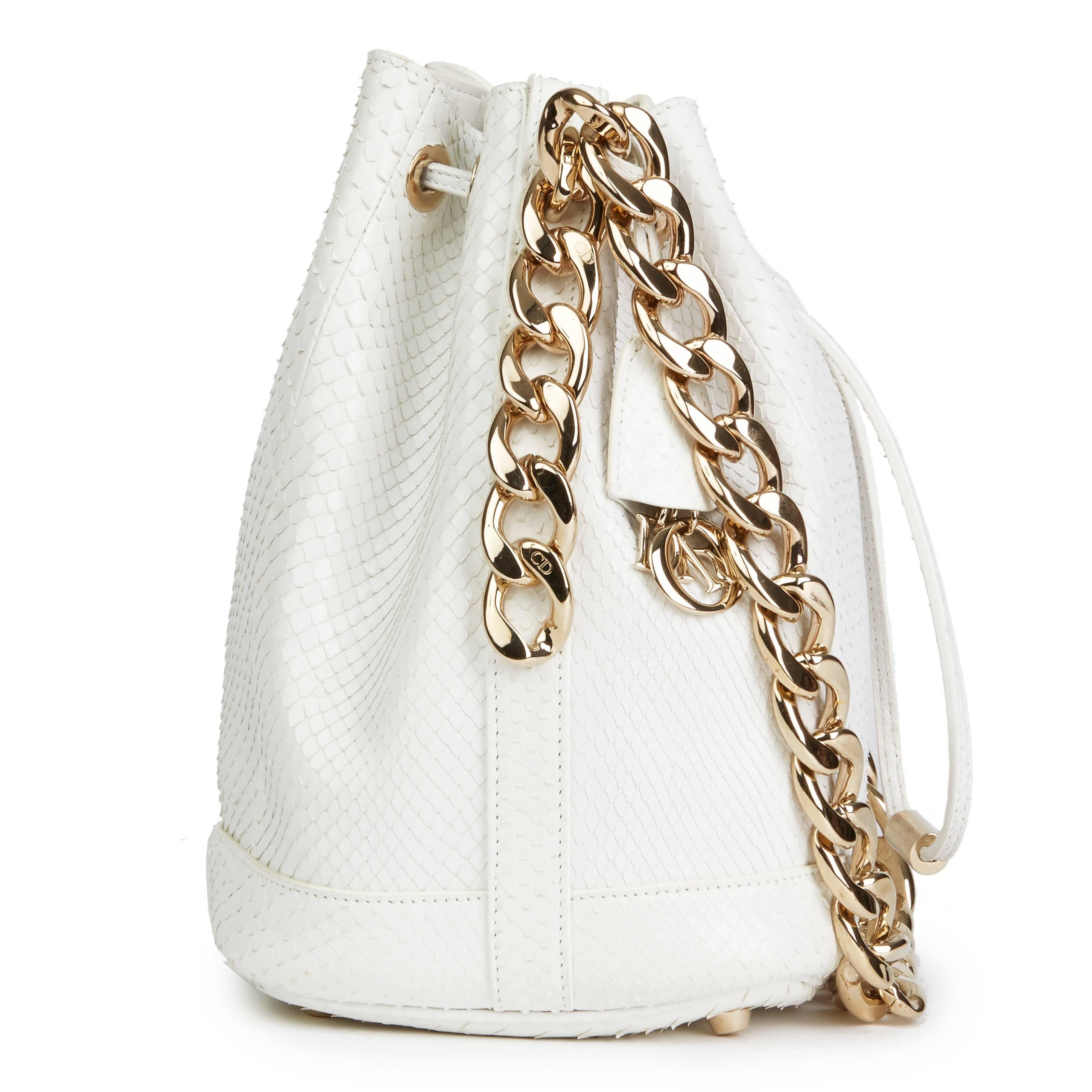 CHRISTIAN DIOR
White Python Leather Small Bubble Bucket Bag

Reference: HB1865
Serial Number: 09-BO-1115
Age (Circa): 2015
Authenticity Details: Date Stamp (Made in Italy)
Gender: Ladies
Type: Shoulder

Colour: White
Hardware: Gold
Material(s):
