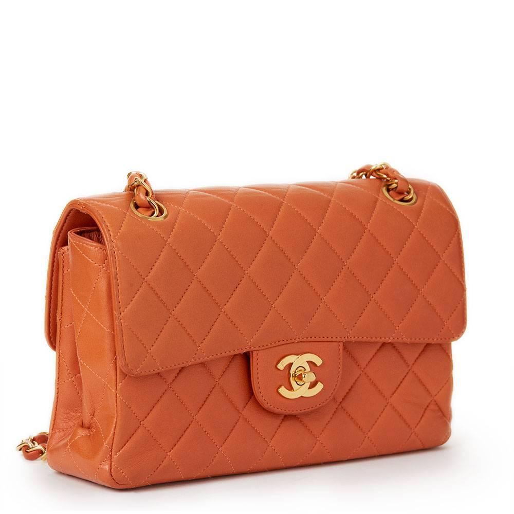 CHANEL
Burnt Orange Quilted Lambskin Small Double Sided Classic Flap Bag

 Reference: HB624
Serial Number: 4021767
Age (Circa): 1996
Accompanied By: Chanel Dust Bag
Authenticity Details: Serial Sticker (Made in France)
Gender: Ladies
Type: