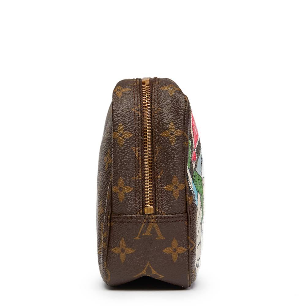 LOUIS VUITTON
Hand-painted 'Lonely for you only'  X Year Zero London Toiletry Pouch

 Reference: HB1300
Serial Number: 881 TH
Age (Circa): 1988
Authenticity Details: Date Stamp (Made in France)
Gender: Ladies
Type: Travel, Accessory

Colour: