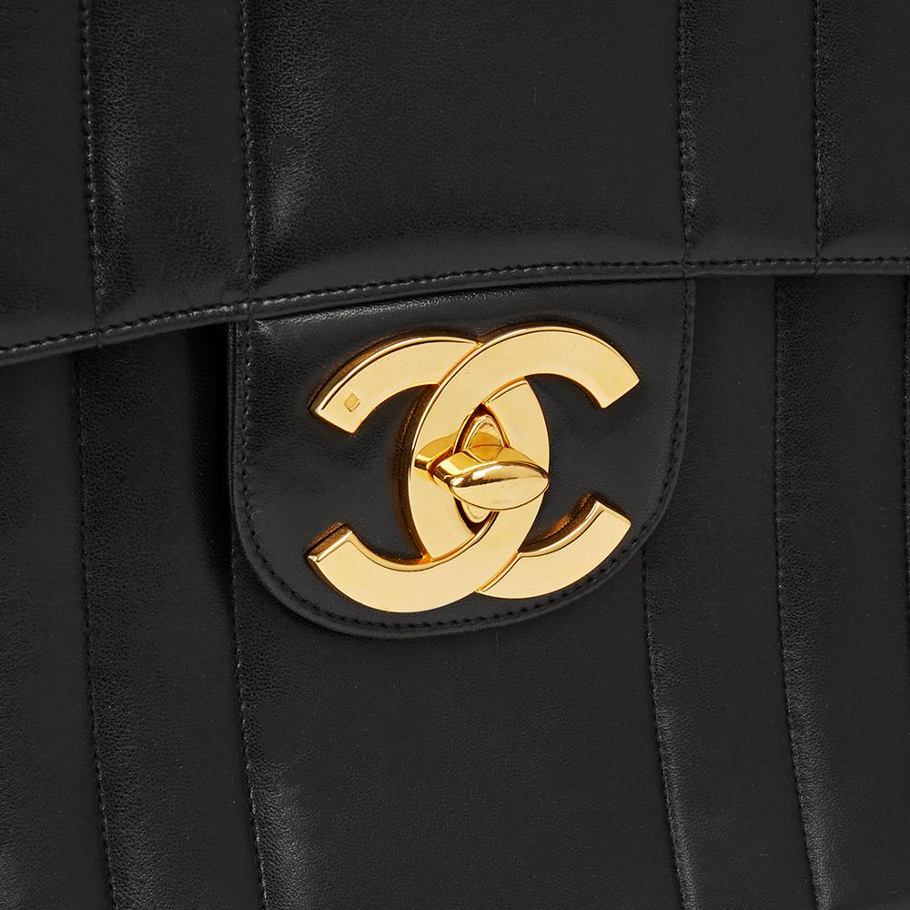 1994 Chanel Schwarz Vertikal gesteppt Lammfell Vintage Jumbo XL Klappe Tasche 1