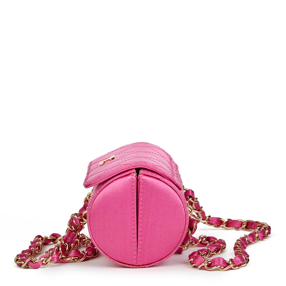 CHANEL
Magenta Quilted Satin Mini Barrel Wristlet

 Reference: HB2003
Serial Number: 9319260
Age (Circa): 2004
Accompanied By: Chanel Dust Bag, Authenticity Card
Authenticity Details: Serial Sticker, Authenticity Card (Made in Italy)
Gender:
