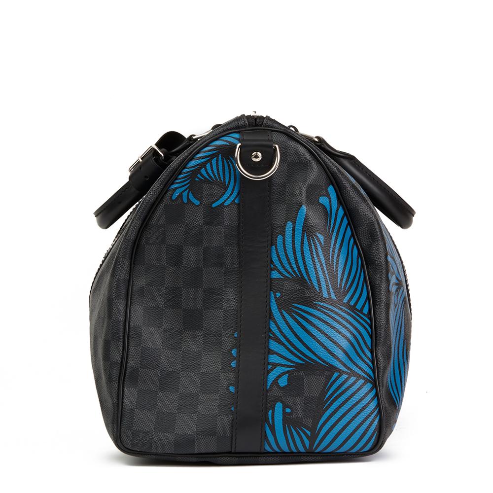 LOUIS VUITTON
Graphite Damier Monogram Canvas Christopher Nemeth Blue Rope Keepall Bandouliere 45

 Reference: HB2036
Serial Number: MB4116
Age (Circa): 2016
Accompanied By: Shoulder Strap, Handle Keeper
Authenticity Details: Date Stamp (Made in