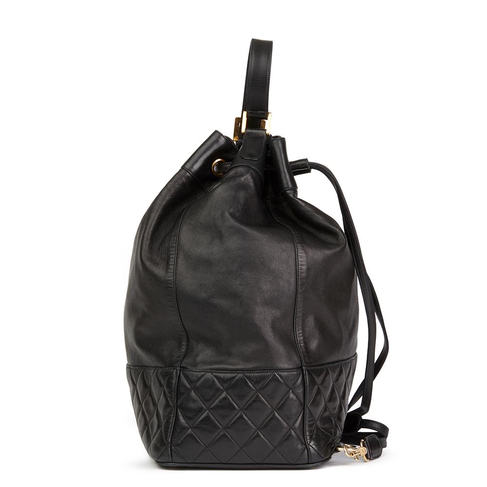 CHANEL
Black Quilted Lambskin Vintage Timeless Backpack

 Reference: HB2040
Serial Number: 1839847
Age (Circa): 1991
Accompanied By: Authenticity Card, Interior Pouch
Authenticity Details: Authenticity Card, Serial Sticker (Made in Italy)
Gender:
