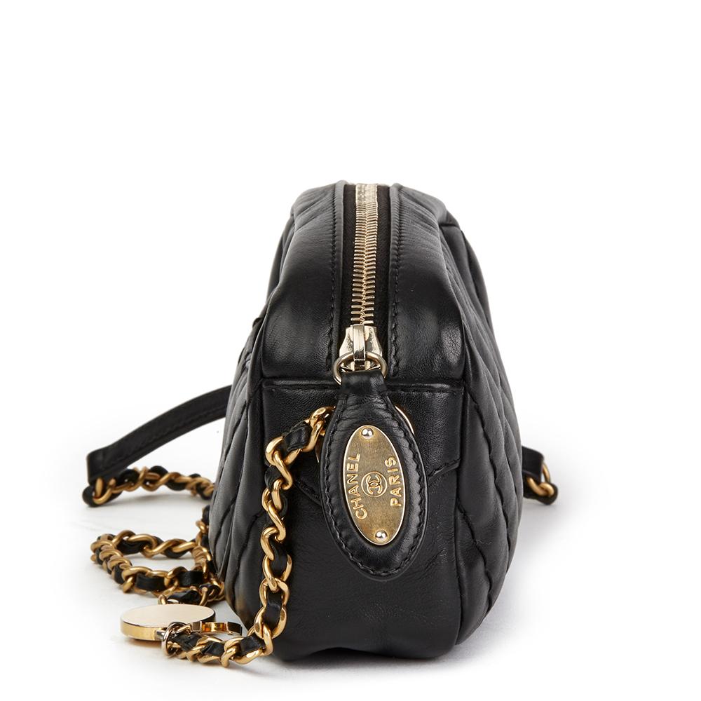 CHANEL
Black Chevron Quilted Calfskin Leather Mini Medallion Charm Camera Bag

 Reference: HB2041
Serial Number: 16157062
Age (Circa): 2012
Accompanied By: Chanel Dust Bag
Authenticity Details: Serial Sticker (Made in Italy)
Gender: Ladies
Type: